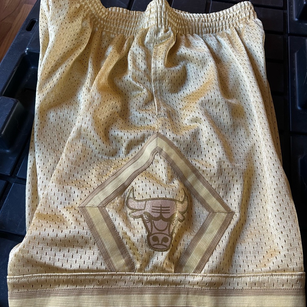 Mitchell & Ness gold shorts